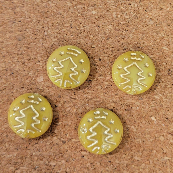 Four greasy yellow Czech glass disc beads with metallic gold Christmas tree designs.