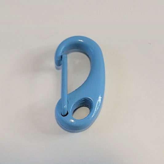 A light blue painted metal carabiner hook with a circular hole at the base, shown on a plain off-white background.