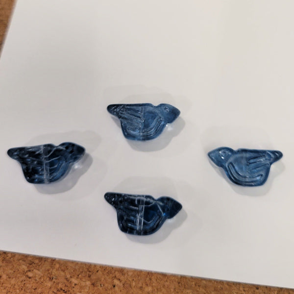 Four stormy blue pressed glass bird beads