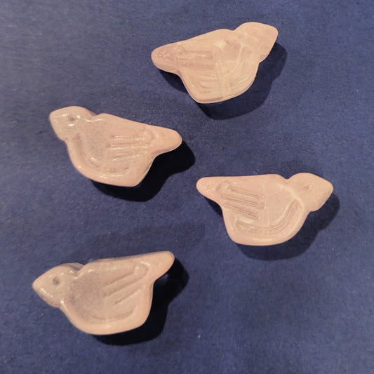 Four milky blush pink pressed glass bird beads