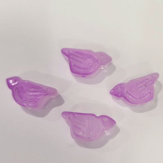 Four orchid purple pressed glass bird beads